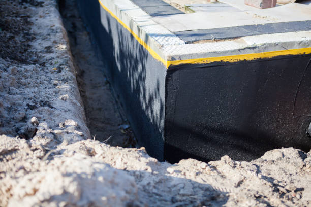 Professional Waterproofing technician working in Roachdale, IN